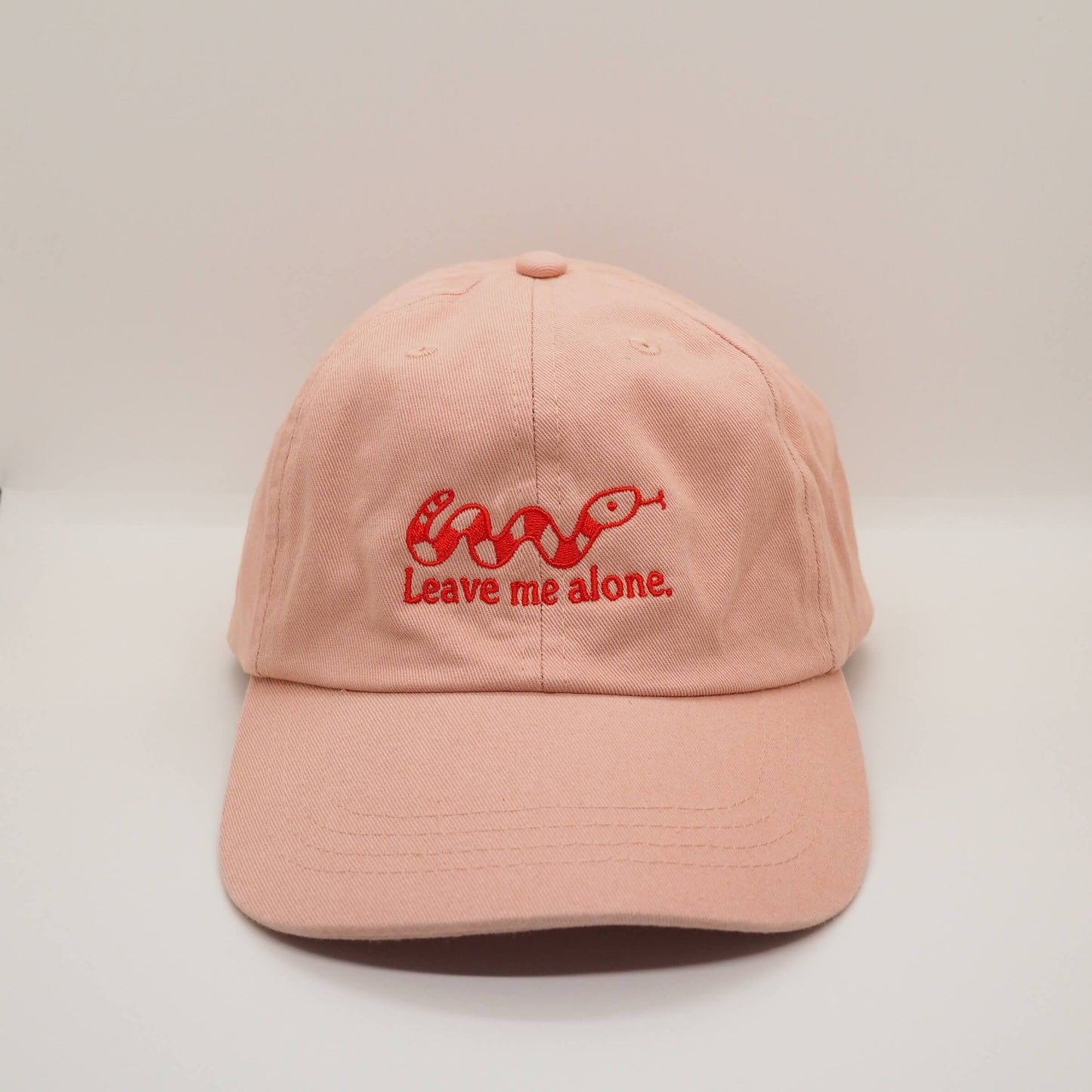 Embroidered Pink Cotton Cap with Snake design and the slogan Leave me alone. Streetwear Punk Fun Accessories