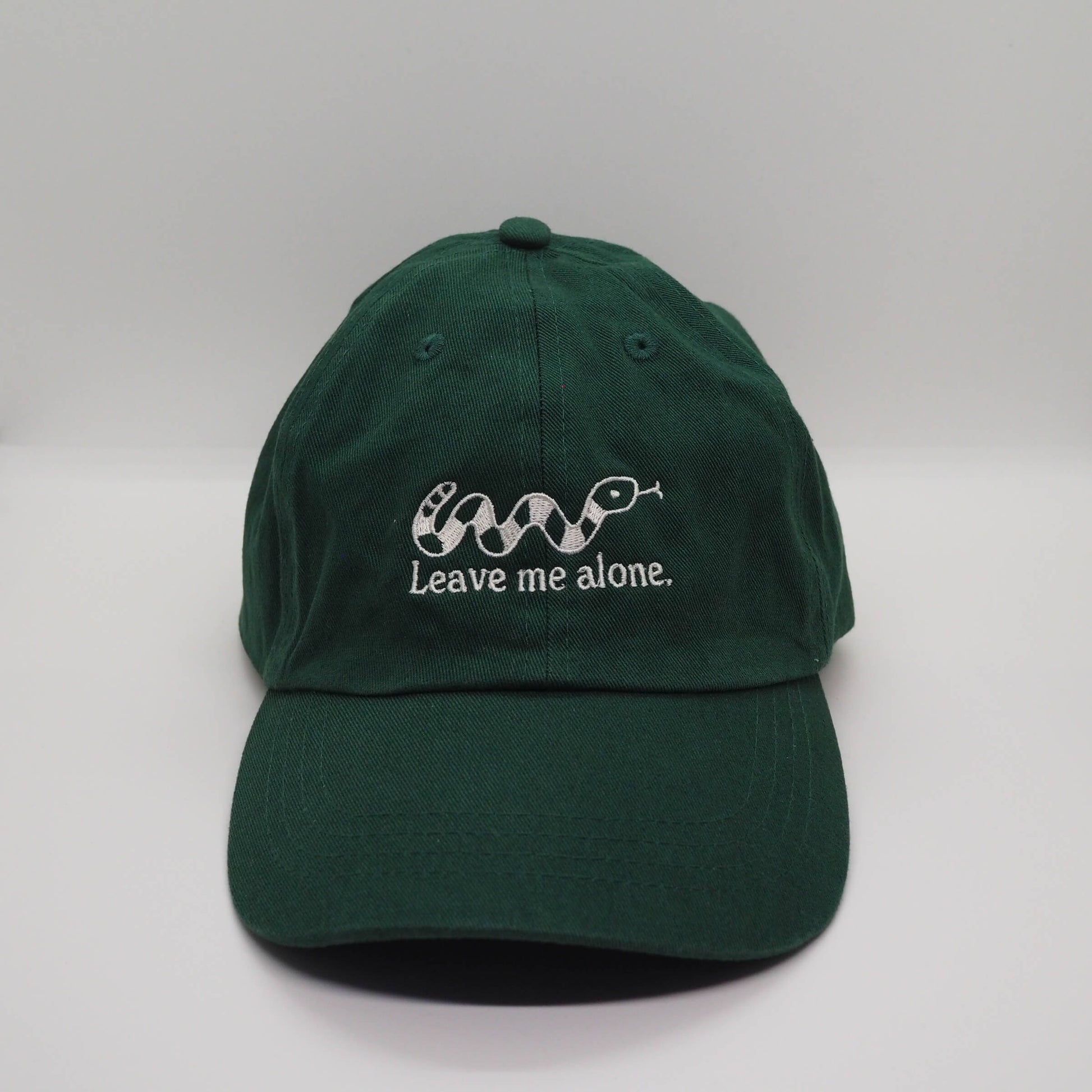 Embroidered Green Cotton Cap with Snake design and the slogan Leave me alone. Streetwear Punk Fun Accessories