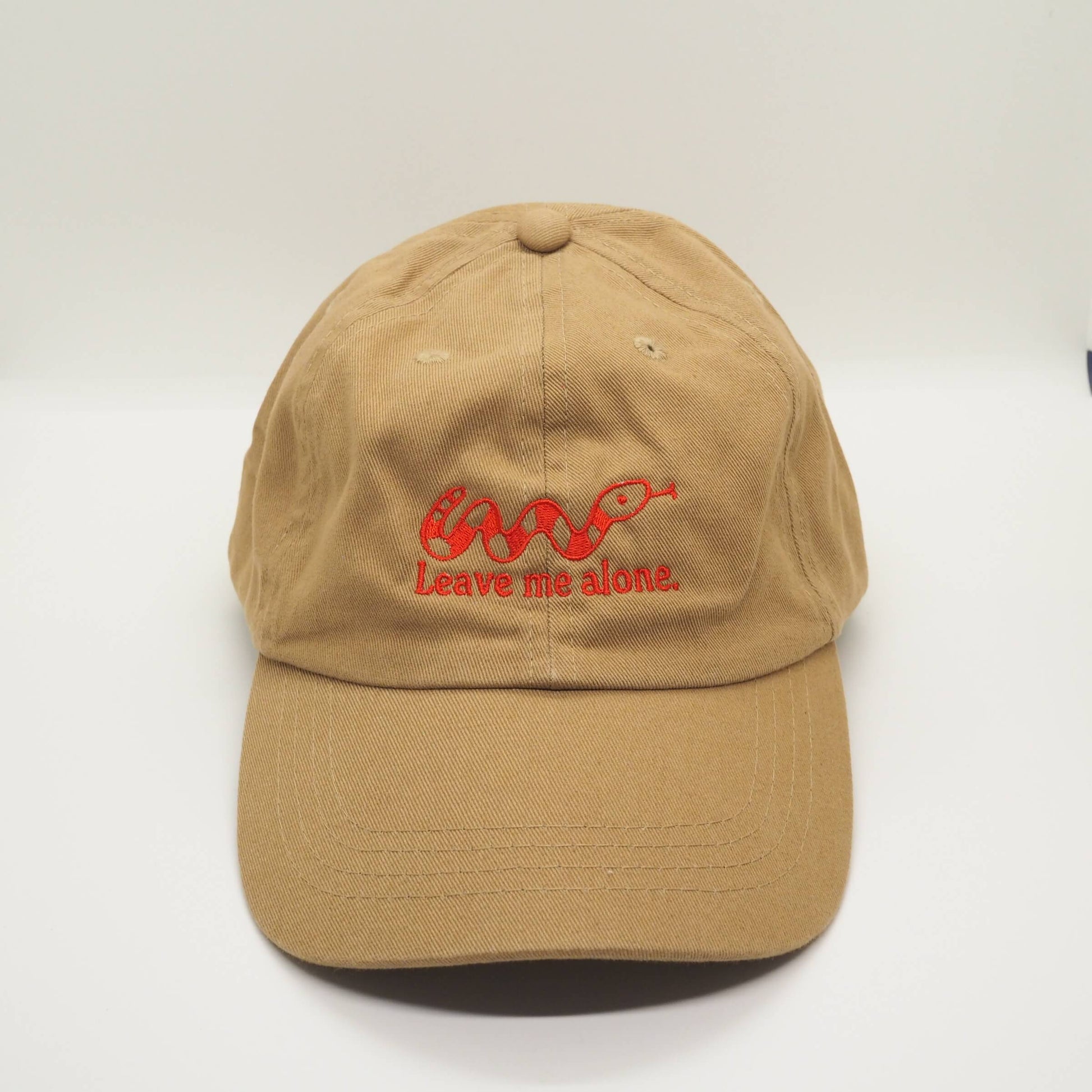 Embroidered Camel Brown Cotton Cap with Snake design and the slogan Leave me alone. Streetwear Punk Fun Accessories
