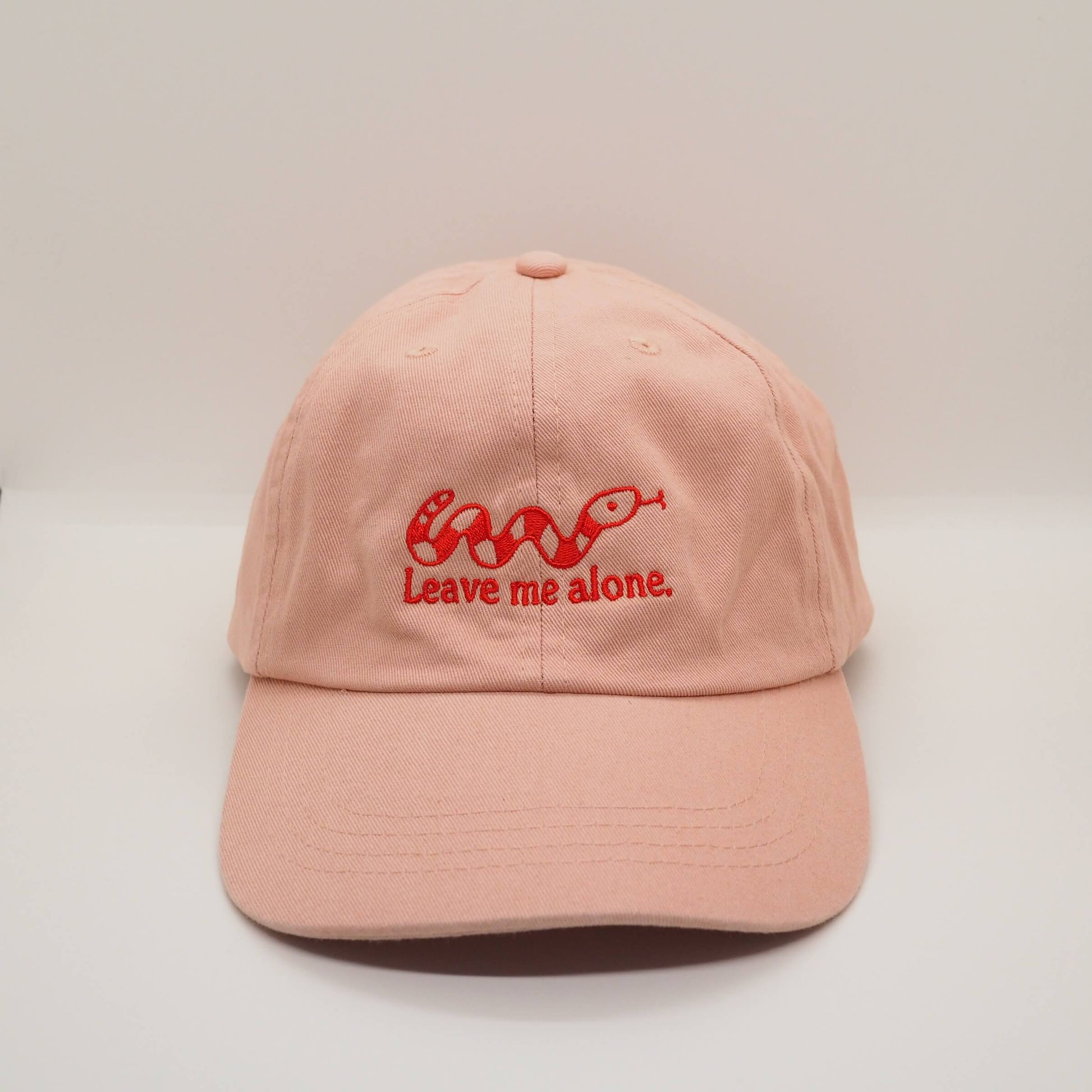 Embroidered Pink Cotton Cap with Snake design and the slogan Leave me alone. Streetwear Punk Fun Accessories