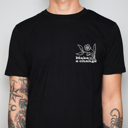 Make a Change unisex black t-shirt front print featuring a flower illustration and a slogan - environmental justice streetwear 
