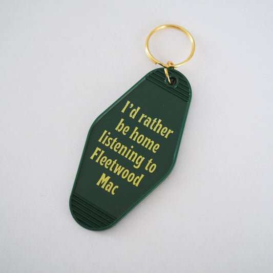 A retro motel keychain with the claim I'd rather be home listening to Fleetwood Mac - Fun 70s music accessories
