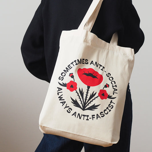 Organic Cotton Cavnas Tote Bag Shopper with a screen printed design of a flower and the slogan sometimes antisocial always antifascist - political punk accessories
