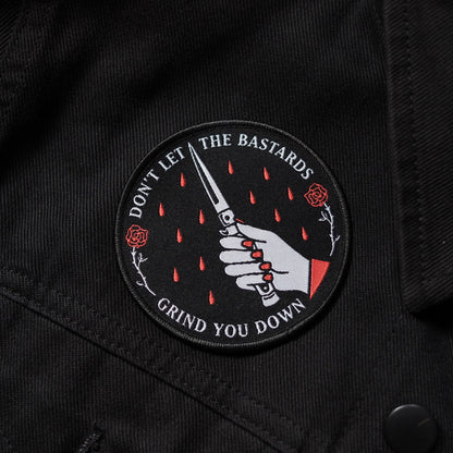Don't let the bastards grind you down (The Handmaid's Tale-inspired) - Iron-on Woven Patch
